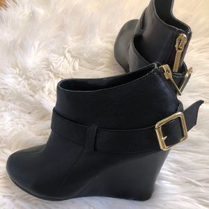Black wedge booties with gold buckle, size 8